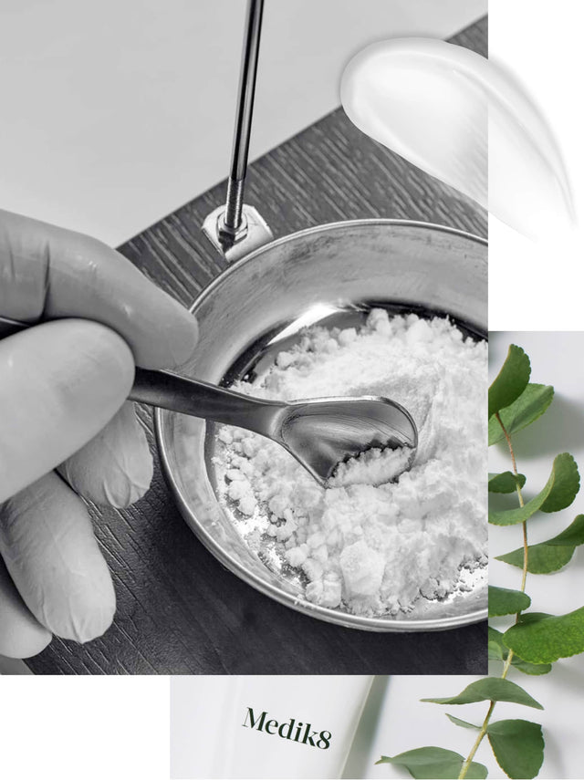 Närbild på laboratoriehand som förbereder ingredienser i en skål med pulver.