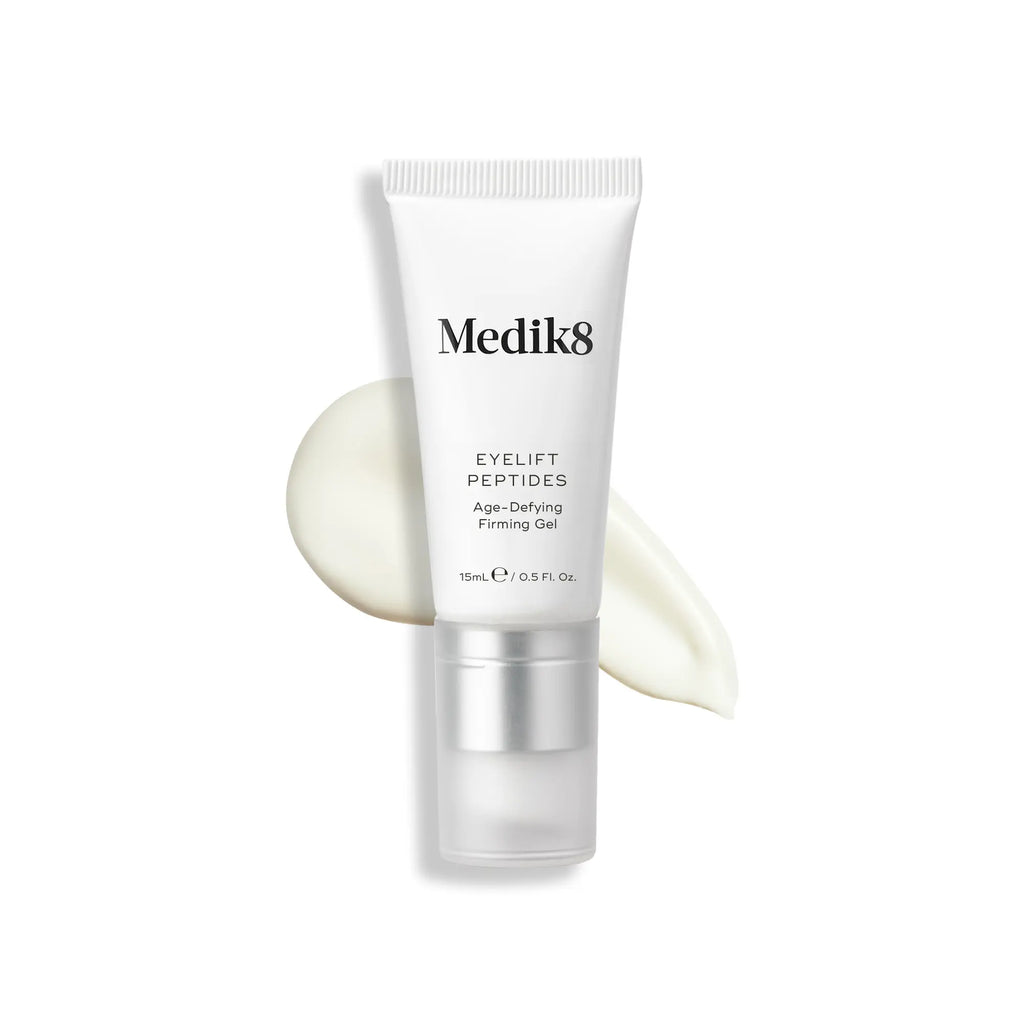 Medik8 Eyelift Peptides i en vit tub med gel bakom.