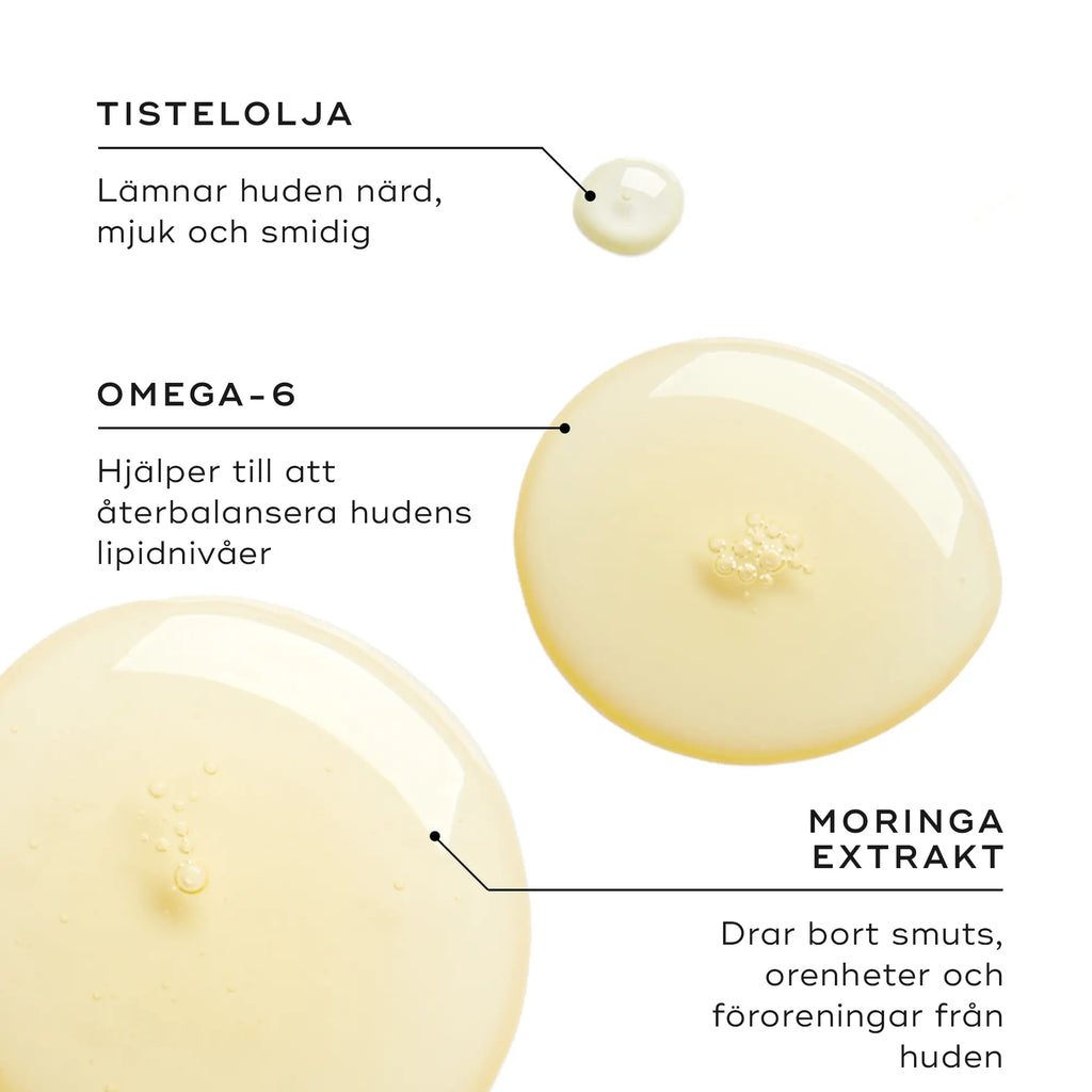 Närbild av oljedroppar som illustrerar ingredienser som safflorolja, omega-6 och moringaextrakt, som hjälper till att vårda huden.
