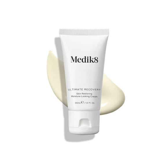 Produktbild av Medik8 Ultimate Recovery, vit tub med kräm utspridd i bakgrunden.-14