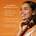 Kvinna som håller i Medik8 C-Tetra Luxe, med fördelar för huden listade