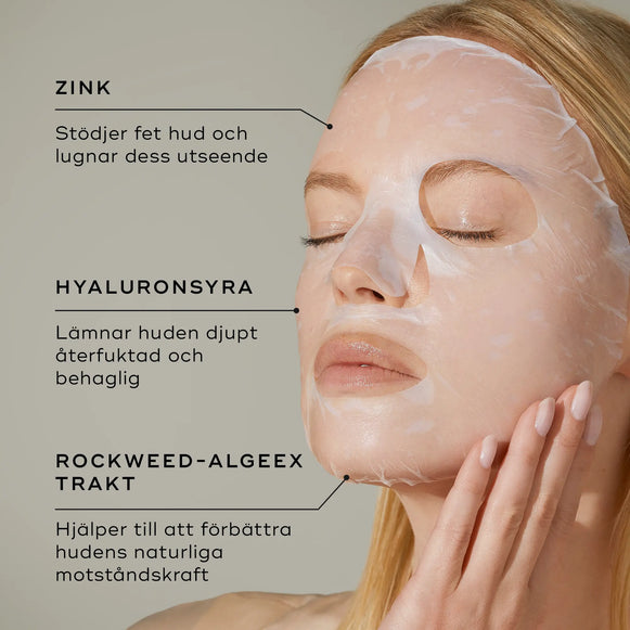Bild av en person med Medik8 Ultimate Recovery Bio-Cellulose Mask på ansiktet, med information om maskens huvudingredienser, inklusive zink, hyaluronsyra och rockweed-algextrakt.-hover-5